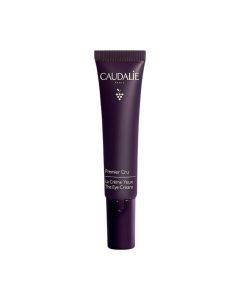 Caudalie Premier Cru krema za područje oko očiju, 30 ml - ispravlja 8 znakova  starosti, bez kompromisa: sitne bore oko očiju, natečenost, bore na usnama, fine linije, podočnjake, hidratacija, tamne mrlje i sjaj. Proizvod u ljubičastoj tubi na bijeloj poz