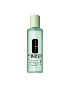 CLINIQUE Clarifying lotion 1 200 ml -  tekući losion razvijen od strane dermatologa za eksfolijaciju lica isključivo vrlo suhe prema suhe kože. Zeleno crna boca proizvoda na bijeloj pozadini.