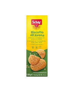 Dr. Schär zobeni biskvit - Biscotto all'Avena 130 g - jedan zalogaj ovog hranjivog, cjelovitog, okruglog blaga pruža istinsko kraljevsko zadovoljstvo! Žuto zelena kutija biskvita na bijeloj pozadini.