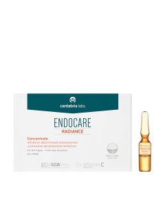 ENDOCARE Radiance Contentrate 14 x 1 ml - intenzivan anti-age tretman koji pomaže reduciranju vidljivih znakova starenja te izrazito potiče sjaj kože. Bijelo narančasto zelena kutija i narančasta ampula proizvoda na bijeloj pozadini.