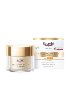 Eucerin Hyaluron-Filler + Elasticity dnevna njega SPF 15 - Ispunjava duboke bore i poboljšava elastičnost kože. Koža je osjetno čvršća i glađa te izgleda svježe i sjajno. Zlatna posudica i bijelo zlatna kutija proizvoda na bijeloj pozadini.