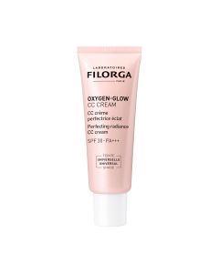 Filorga OXYGEN-GLOW CC krema SPF30 - Prva hibridna CC krema koja pojačava oksigenaciju kože, poboljšava ten i pruža svakodnevnu zaštitu od urbanog načina života. Roza tuba sa bijelim čepom na bijeloj pozadini.