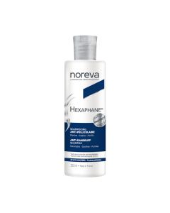 Noreva HEXAPHANE ŠAMPON PROTIV PERUTI 250 ml - učinkovito i dugotrajno uklanja uobičajenu, masnu ili suhu perut. Istovremeno pročišćava vlasište i smiruje svrbež koji ponekad prati perut. Bijelo plava boca proizvoda na bijeloj pozadini.