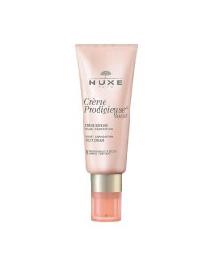 NUXE Crème Prodigieuse Boost Multikorektivna svilenkasta krema 40 ml - svilenkasta krema koja vraća svježinu i blistavost te uklanja prve znakove starenja. Rozo zlatna tuba s pumpicom na bijeloj pozadini.