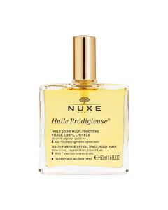 NUXE Huile Prodigieuse Čudesno suho ulje - višenamjensko suho ulje koje hrani, njeguje i uljepšava. Za čudesno njegovanu, obnovljenu i uljepšanu kožu lica i tijela te kosu. Žuto zlatna bočica proizvoda na bijeloj pozadini.