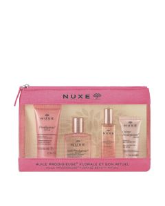 NUXE Prodigieux Travel kit Floral - gel za tuširanje 30 ml + suho ulje 30 ml + parfemsku vodicu 15 ml  + multikorektivna gel krema 15 ml. Floral roza proizvodi u roza neseseru na bijeloj pozadini.