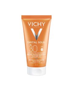 Vichy CAPITAL SOLEIL Dry touch finish za lice SPF 30 dry touch njega visoke zaštite protiv masnoga sjaja. Za muškarce i žene s mješovitom do masnom kožom u potrazi za zaštitom od sunca koja ne čini kožu sjajnom. Zlatno smeđa tuba proizvoda na bijeloj poza