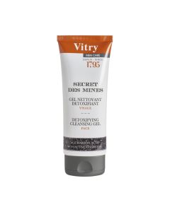 Vitry MEN CARE Detoksicirajući gel za pranje lica 100 ml - formula razvijena za nježno dubinsko čišćenje kože i neutralizaciju učinaka onečišćenja na kožu. Bijelo narančasta tuba proizvoda na bijeloj pozadini.