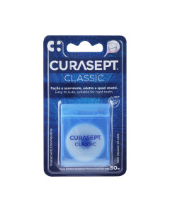 CURASEPT Zubni konac CLASSIC s voskom okusa mente - obložen je posebnim mikrokristalnim voskom koji povećava njegovu glatkoću i otpornost, osigurava učinkovito čišćenje.