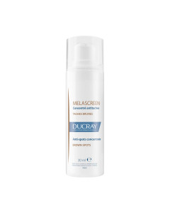 Ducray Melascreen koncentrat protiv hiperpigmentacijskih mrlja 30 ml - za njegu kože s lokaliziranim smeđim mrljama (trudnička maska - melazma, kontracepcijska maska, mrlje nakon akni). Bijelo plavo smeđa bočica s pumpicom na bijeloj pozadini.